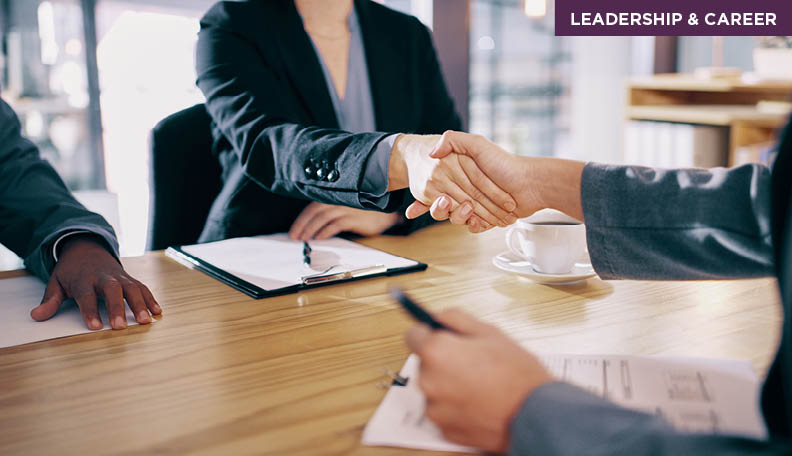 Two people shaking hands